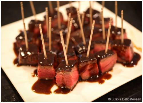 Coffee and chili-rubbed steak bites with Guinness-molasses pan sauce